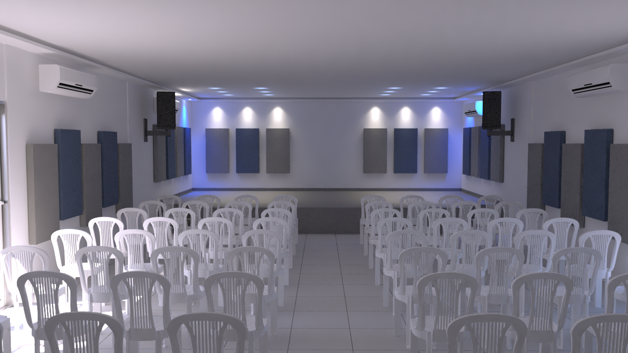 Ingeniero realizando una evaluación acústica en un auditorio